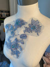 Set of blue and lavender appliqués with beads