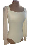 Cream Colored Leo with long mesh sleeves ruched at the wrist